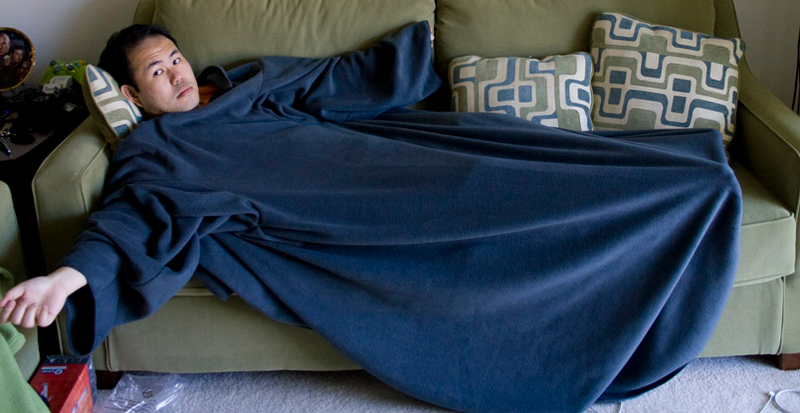 Illustration for article titled Ultimate Battle: The Snuggie vs. Slanket vs. Freedom Blanket vs. Blankoat